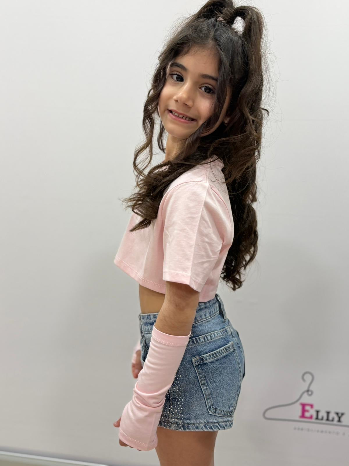 Top crop bambina con manicotti