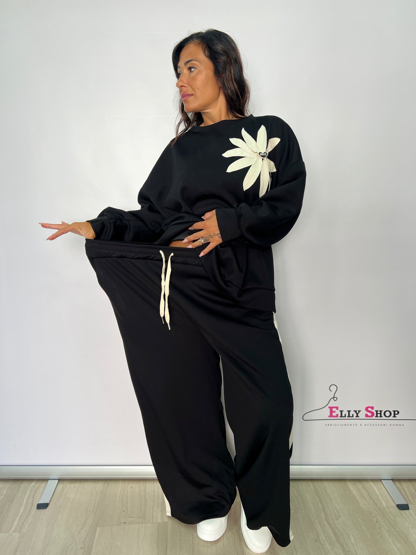 Completo tuta curvy con fiore