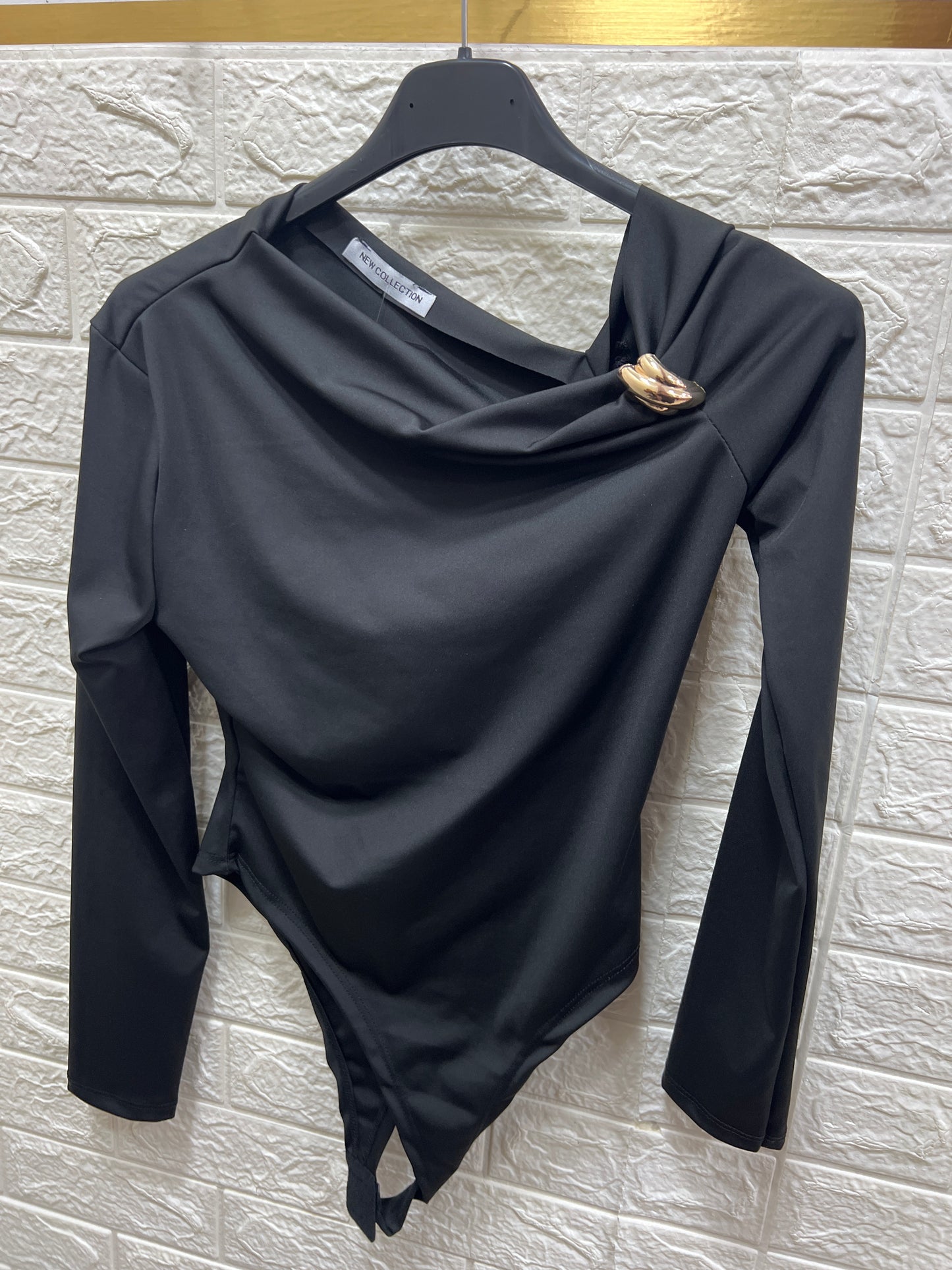 Body kim con accessorio in oro