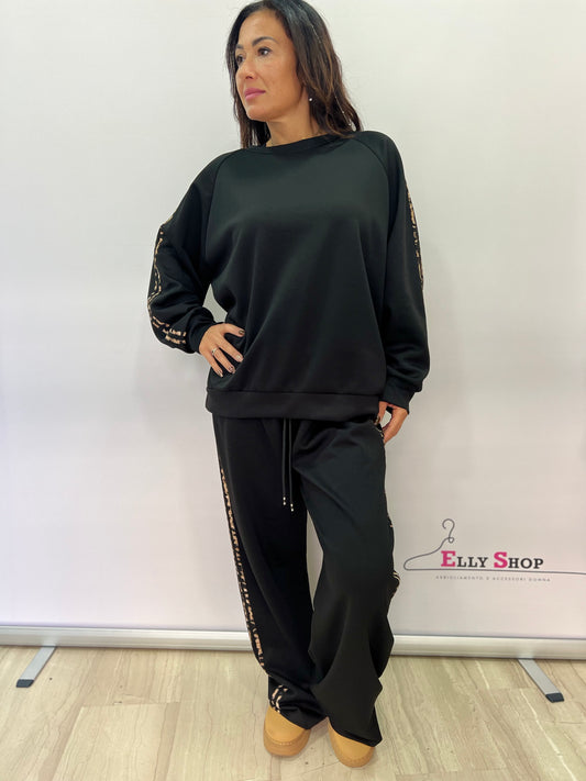 Completo donna curvy nero con bande animalier