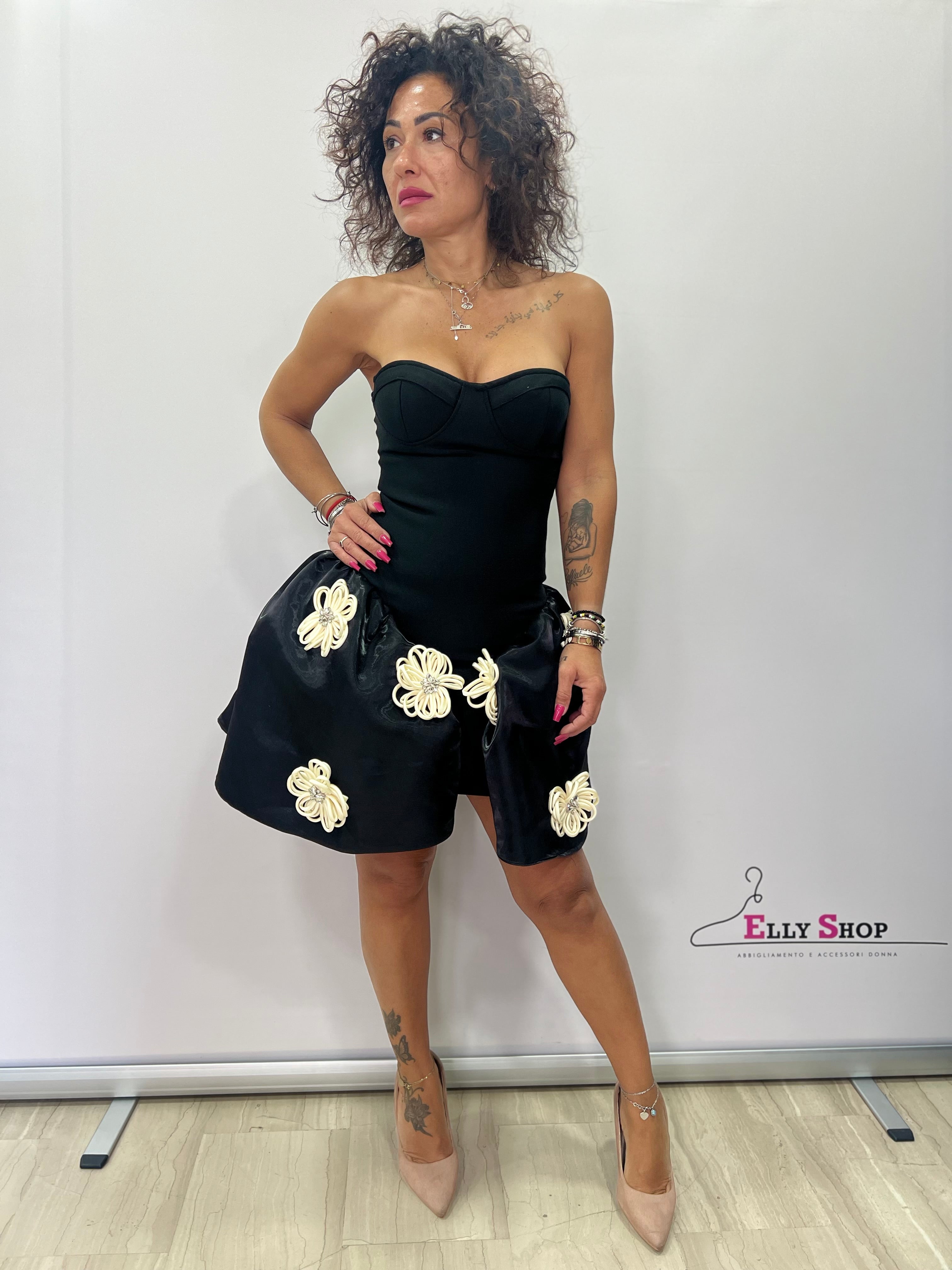 Abito bandage con maxi fiocchi eleganti