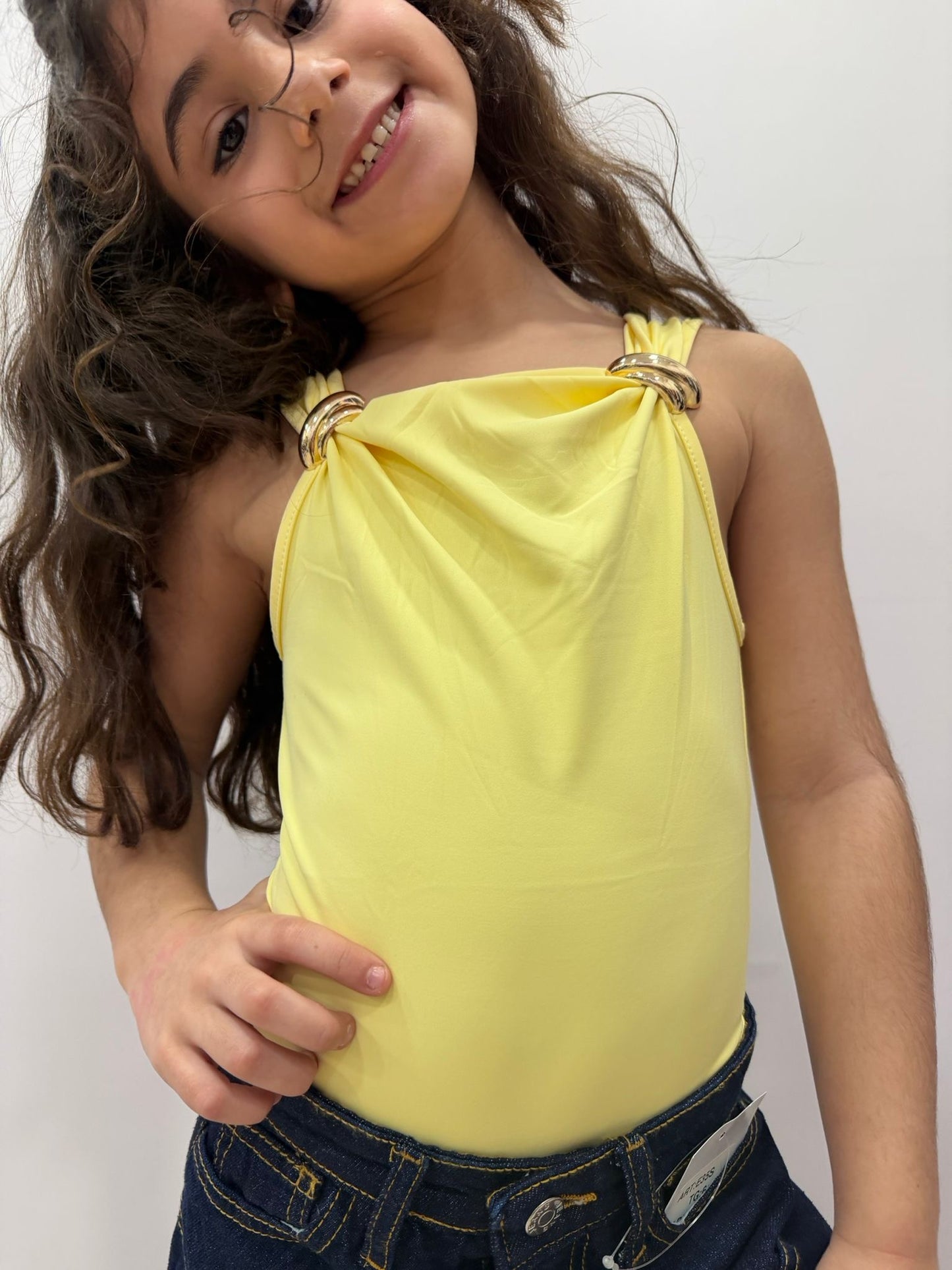 Body bambina con anelli dorati