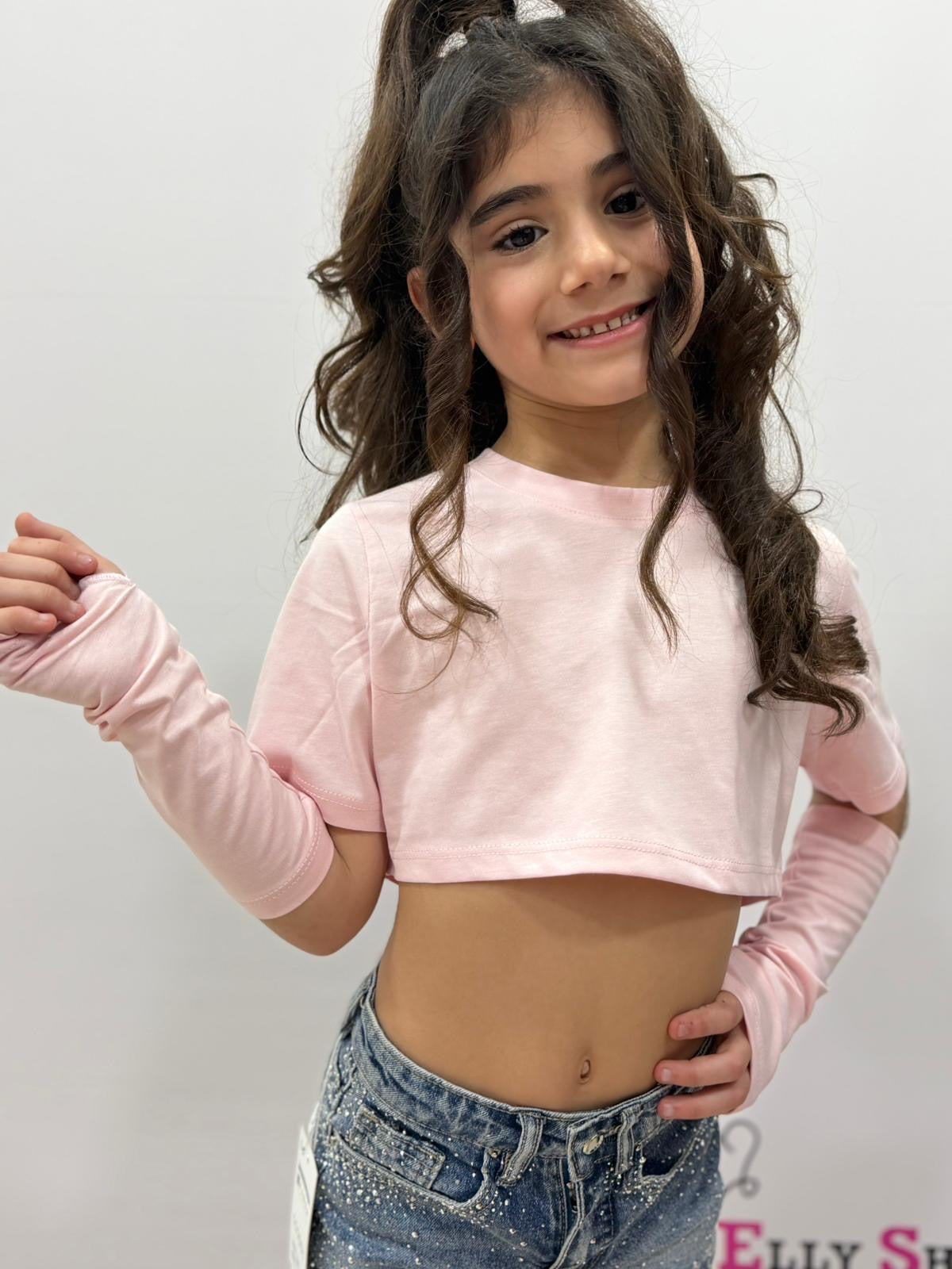 Top crop bambina con manicotti