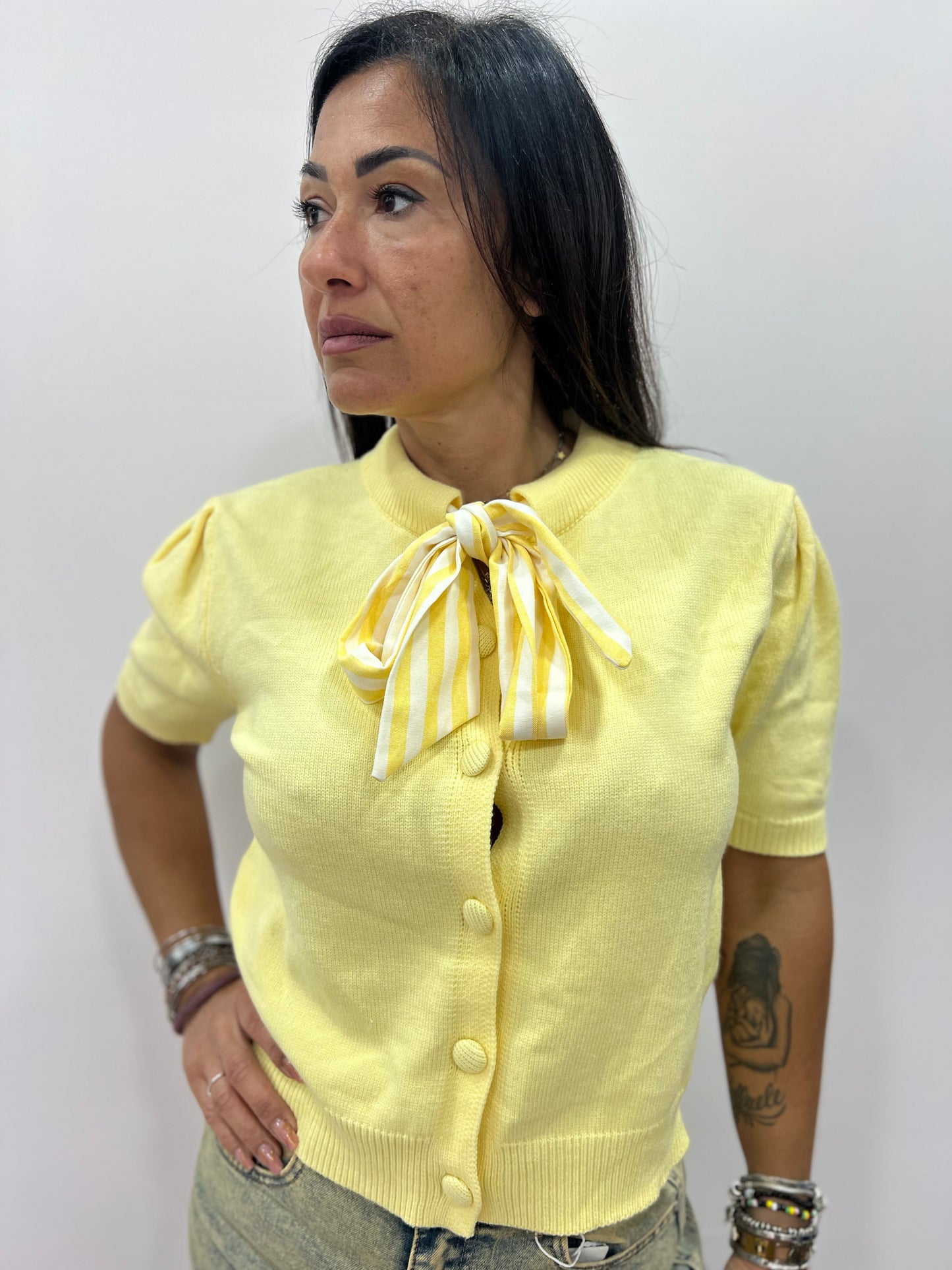 Cardigan donna con fiocco elegante corto