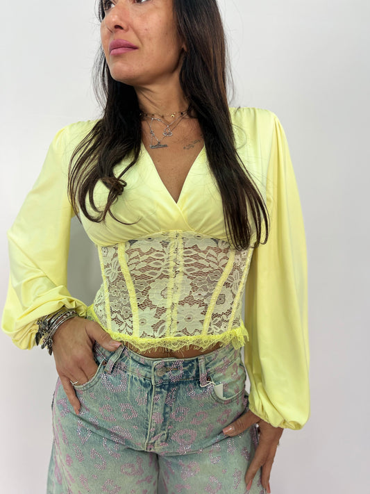 Blusa con pizzo e scollo a V elegante