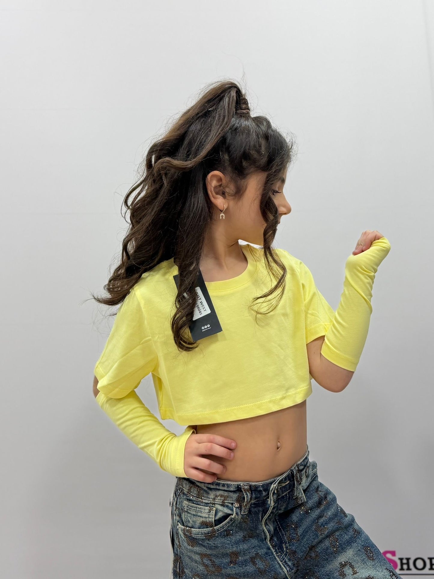 Top crop bambina con manicotti