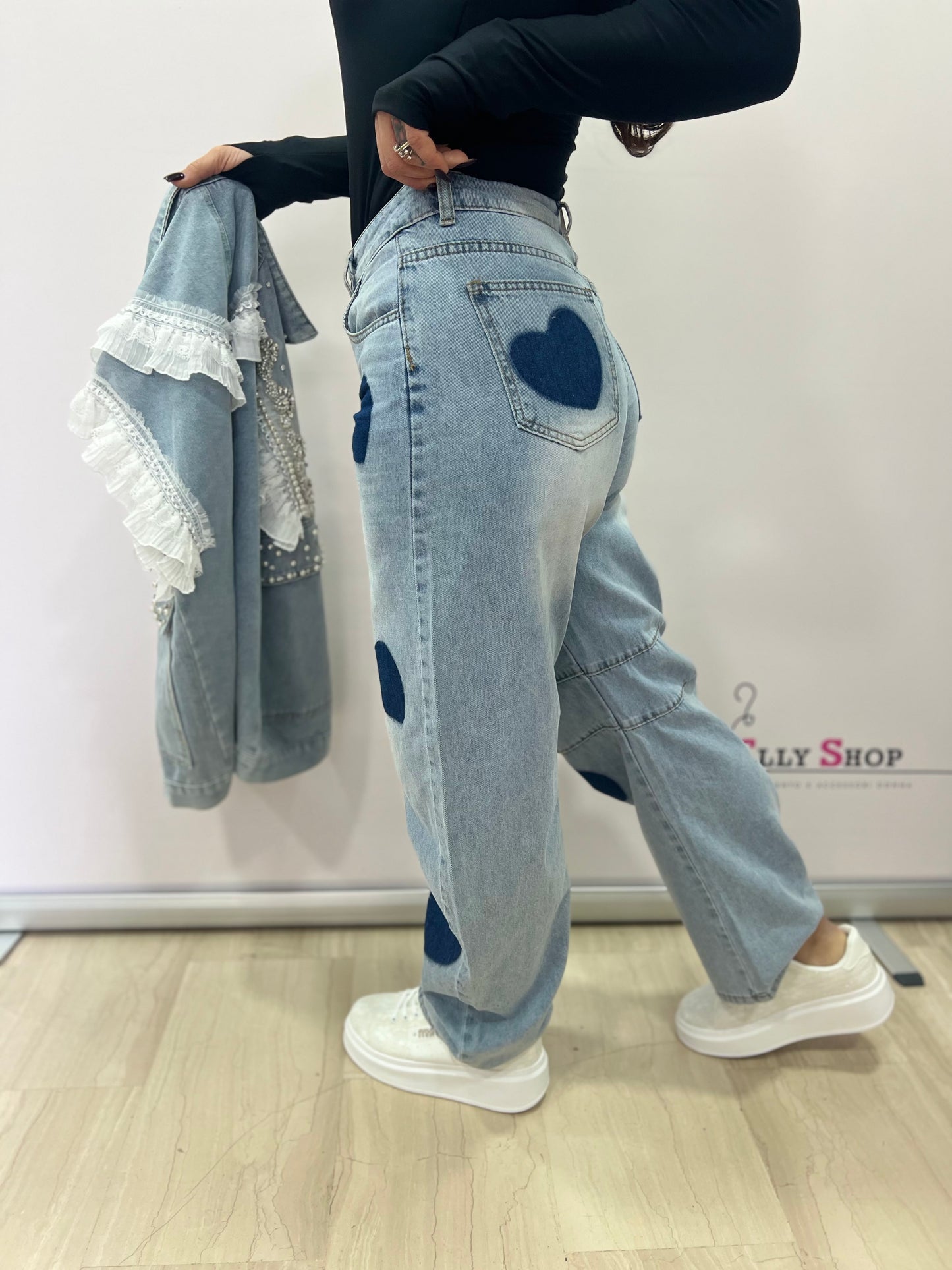 Jeans donna con cuori a vita alta