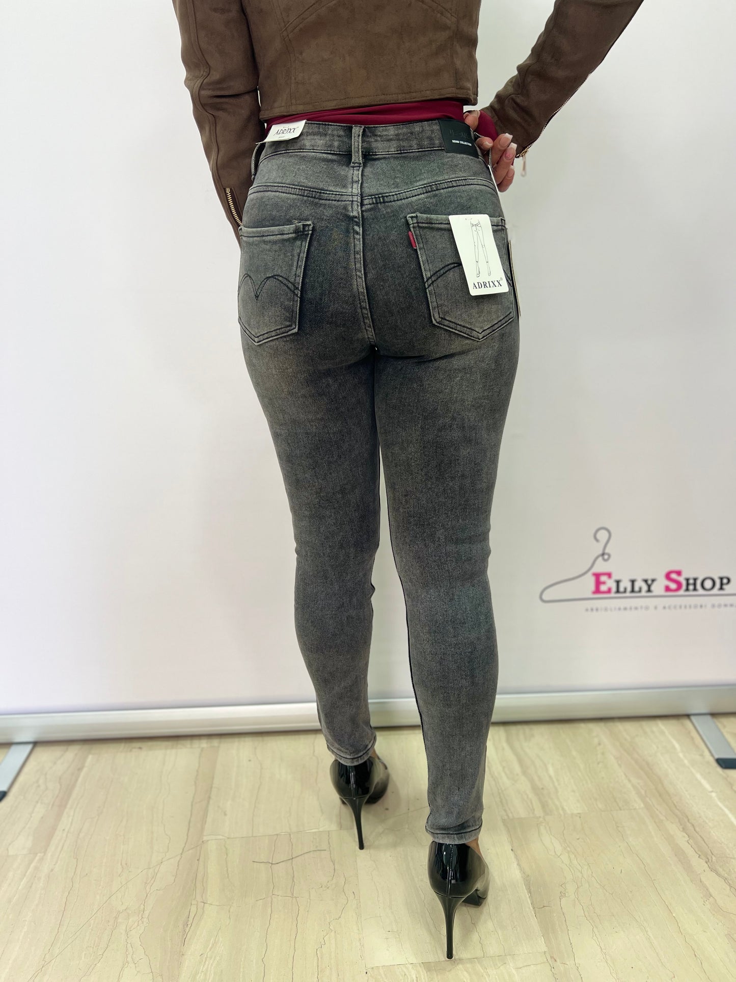 Jeans skinny grigi con strass