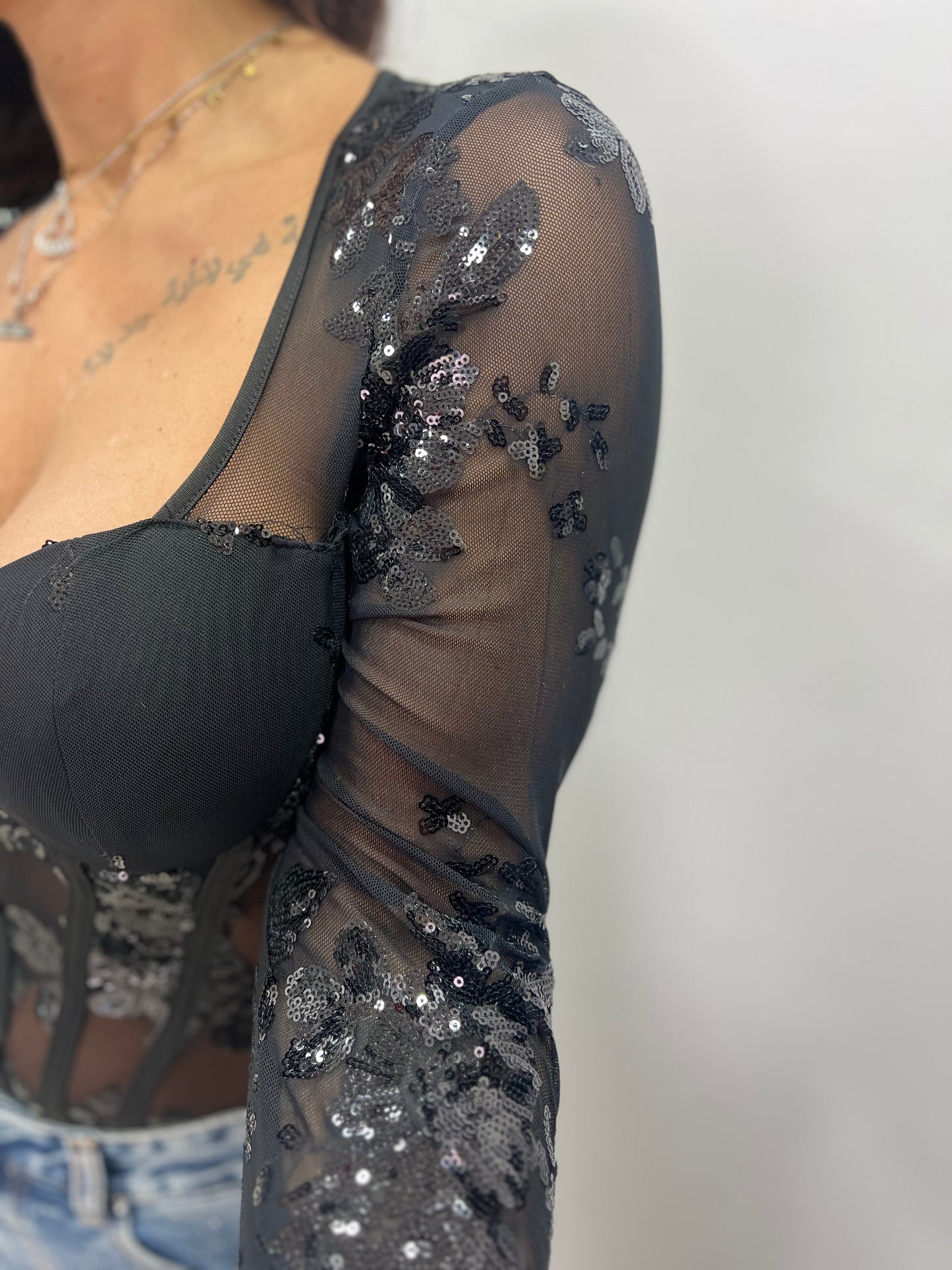 Body trasparente ricamato elegante