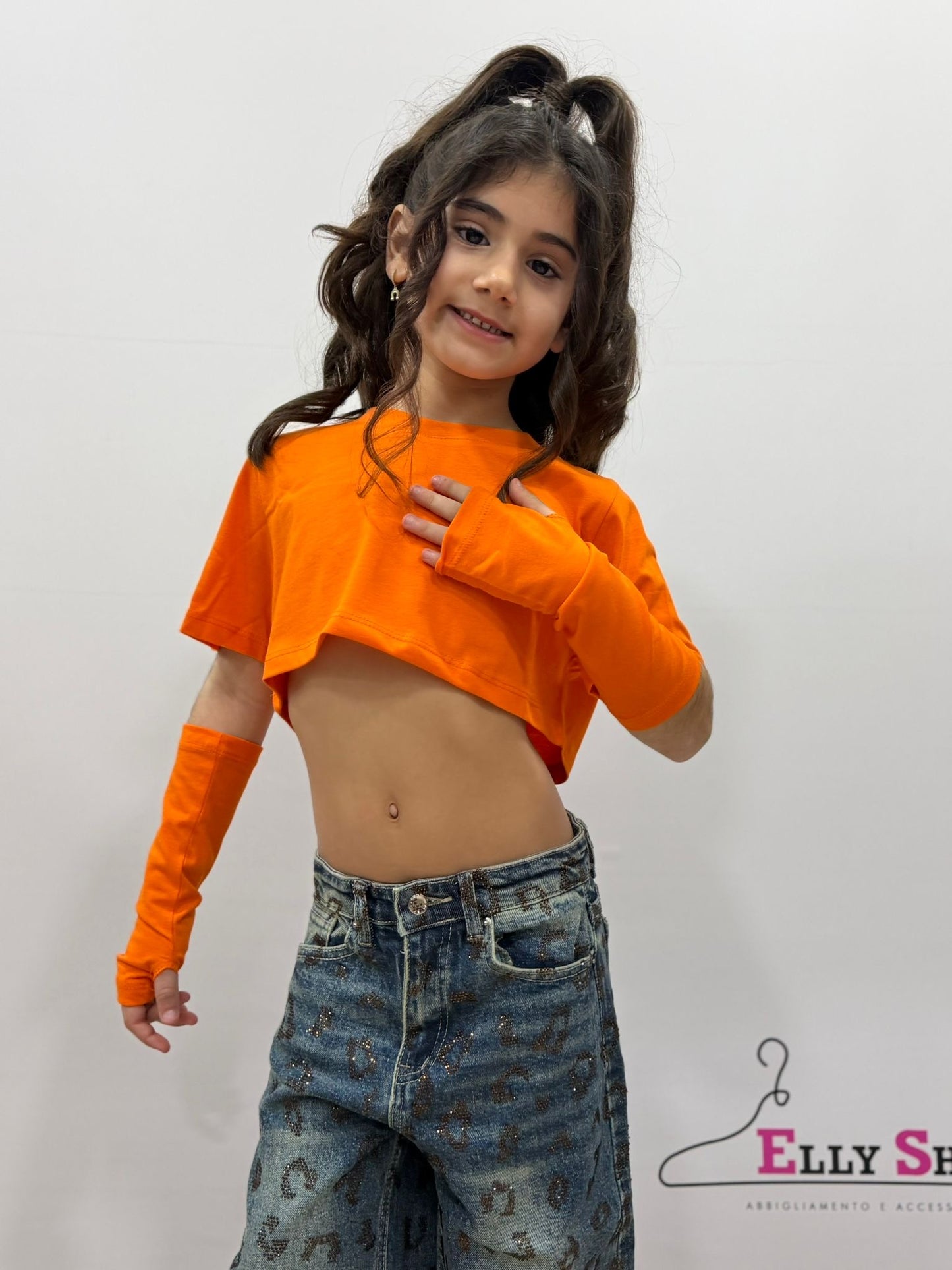 Top crop bambina con manicotti