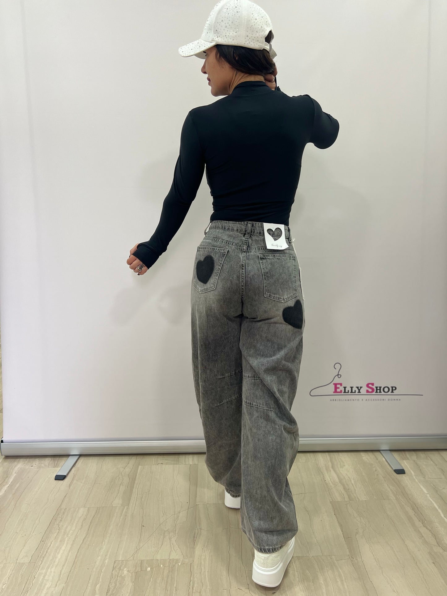 Jeans donna con cuori a vita alta