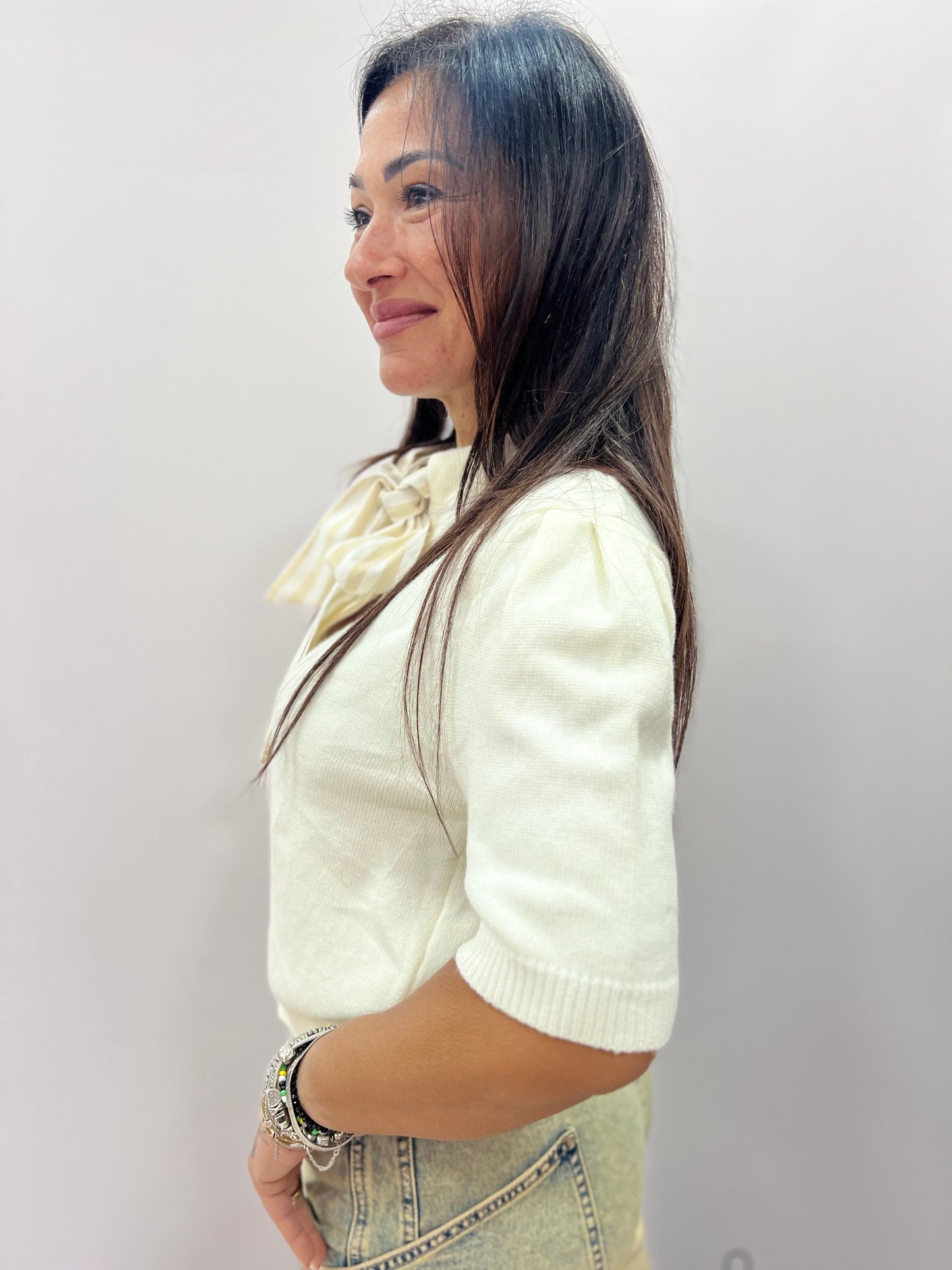 Cardigan donna con fiocco elegante corto